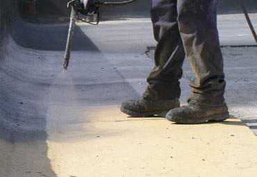 coating systems over Stamford spray foam roof systems